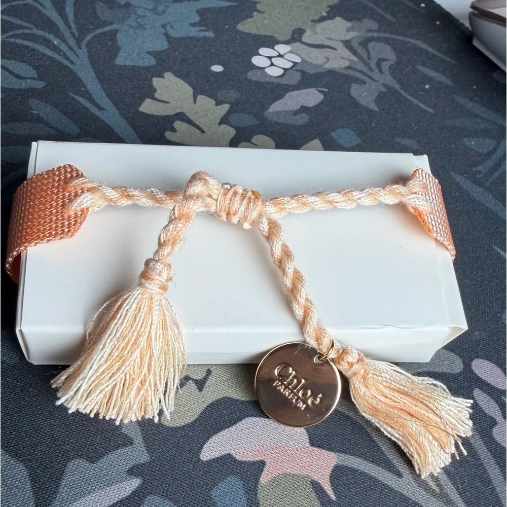 Chloé Authentic “I AM CHLOE”Parfum Peach Woven Tassle Adjustable Bracelet (BNIB) - Picture 3 of 6